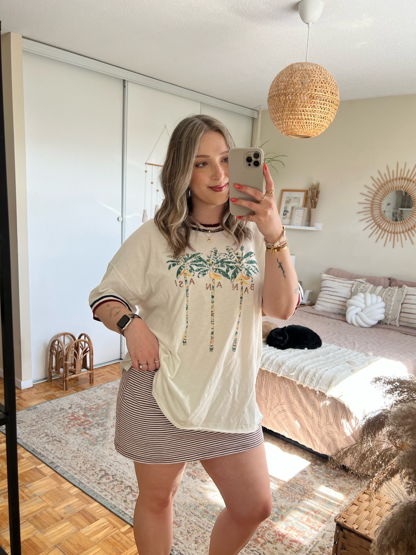 Casual summer outfit! Wearing my usual size L in the graphic tee, and L in the striped mini skirt (has built in shorts!)

#LTKsummer #LTKsale #LTKmidsize