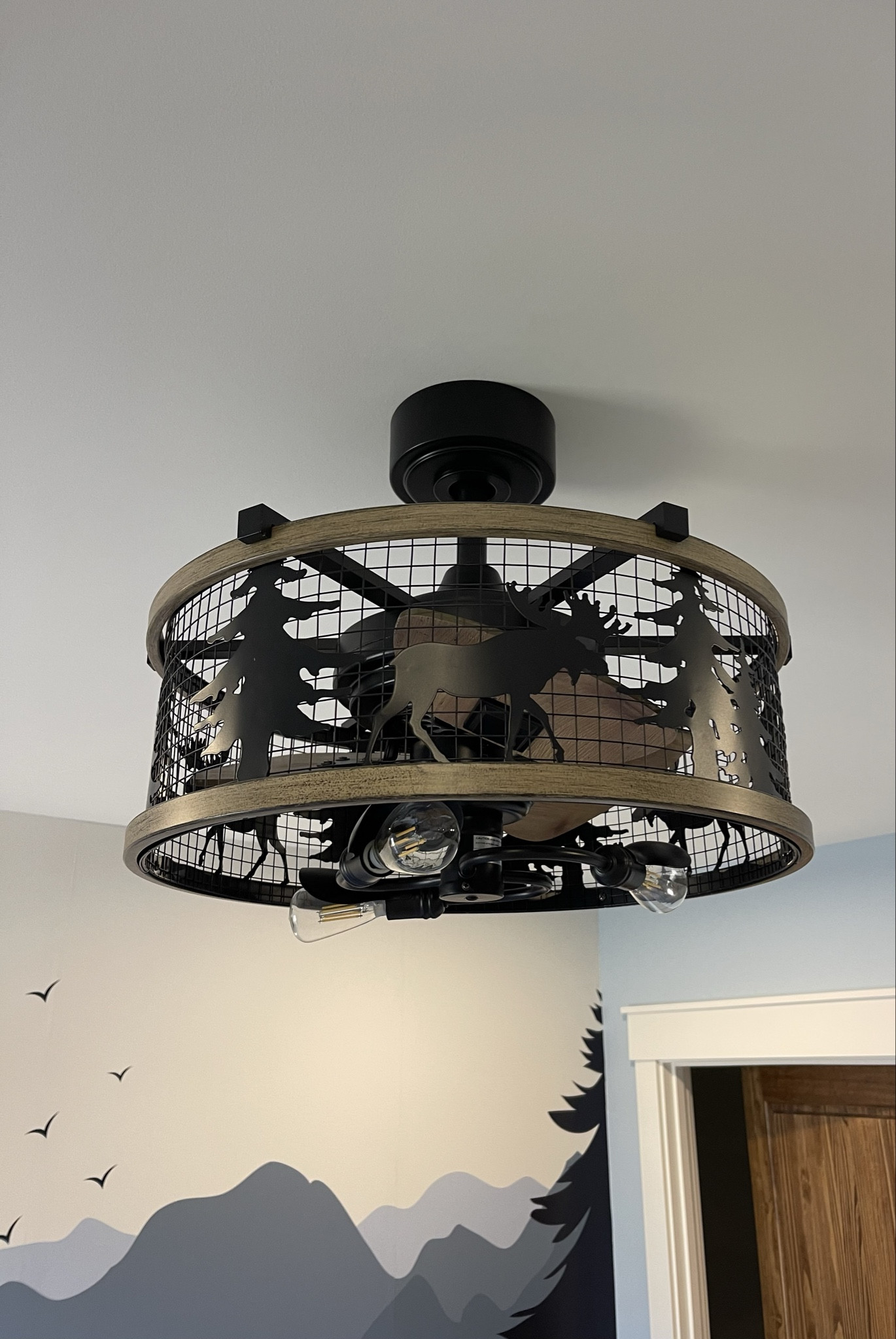 Our son’s bedroom light/fan combo!  He wanted a mountain/woodland themed room and this light couldn’t be more perfect!! 🫎🌲🏔️

Light/fan combo, fan, light, moose, woods, woodland, mountains, boys bedroom, bedroom decor, Amazon home

#LTKover40 #LTKhome #LTKkids