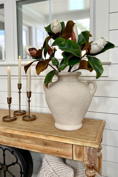 Holiday home styling Christmas decor magnolia leaf stems faux silk artificial florals gold bronze candle sticks flameless flickering taper candles Amazon finds kirklands entry table sofa table home decor 

#LTKHoliday #LTKhome #LTKstyletip