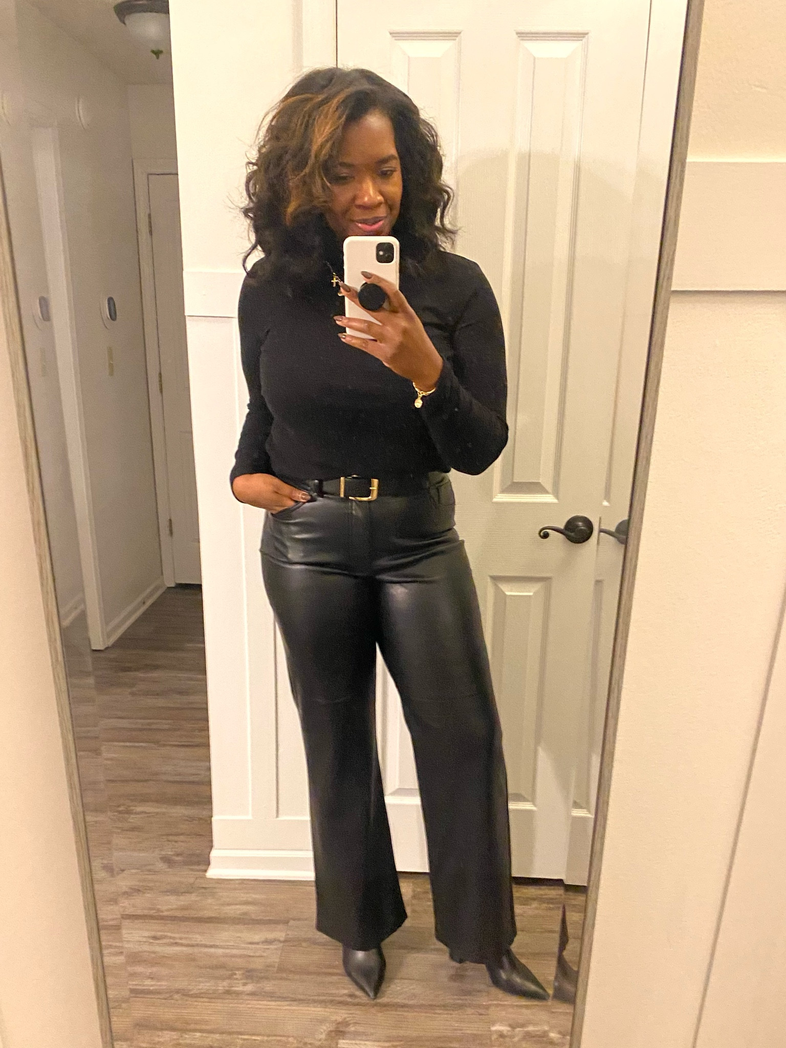 Black on black outfit. High waisted leather pants from Express. Lined to keep you warm in these frigid temps. Im in a 12L.

#LTKStyleTip #LTKMidsize