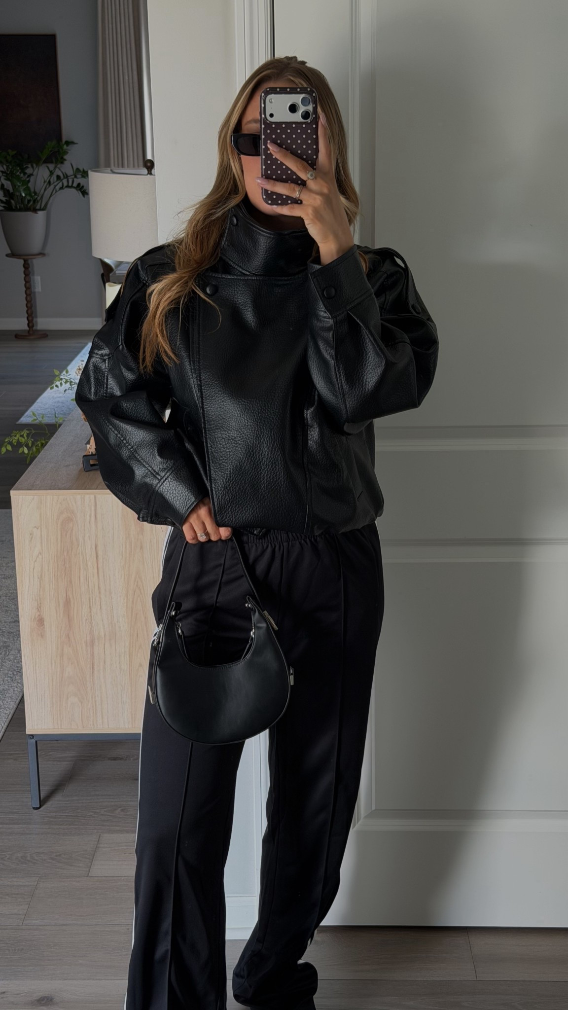 Spring leather jacket and track pants outfit #casualoutfit #trackpants #leatherjacket #springoutfit #allblackoutfit

#LTKootd