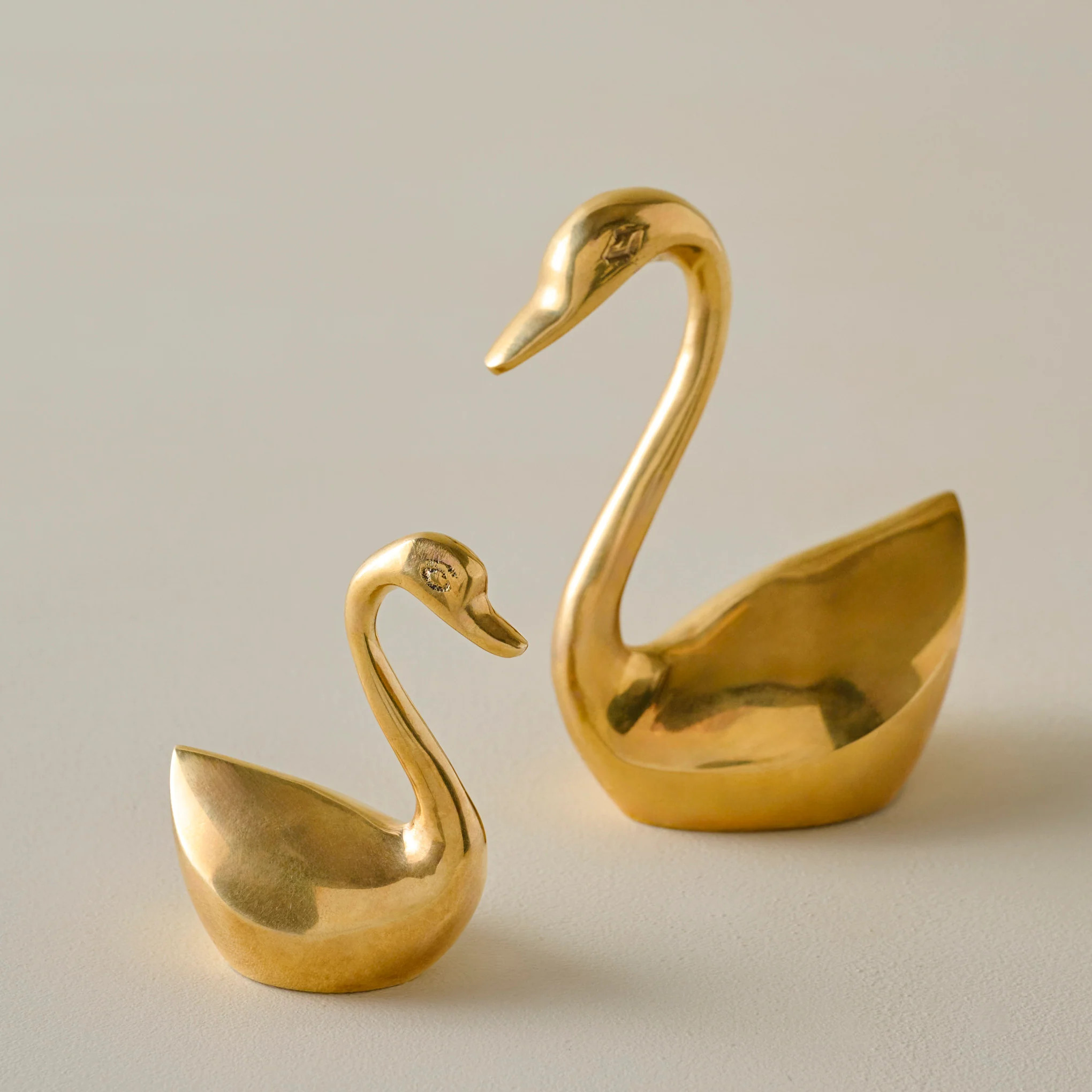 Vintage-Inspired Brass Sit About Swan | Magnolia