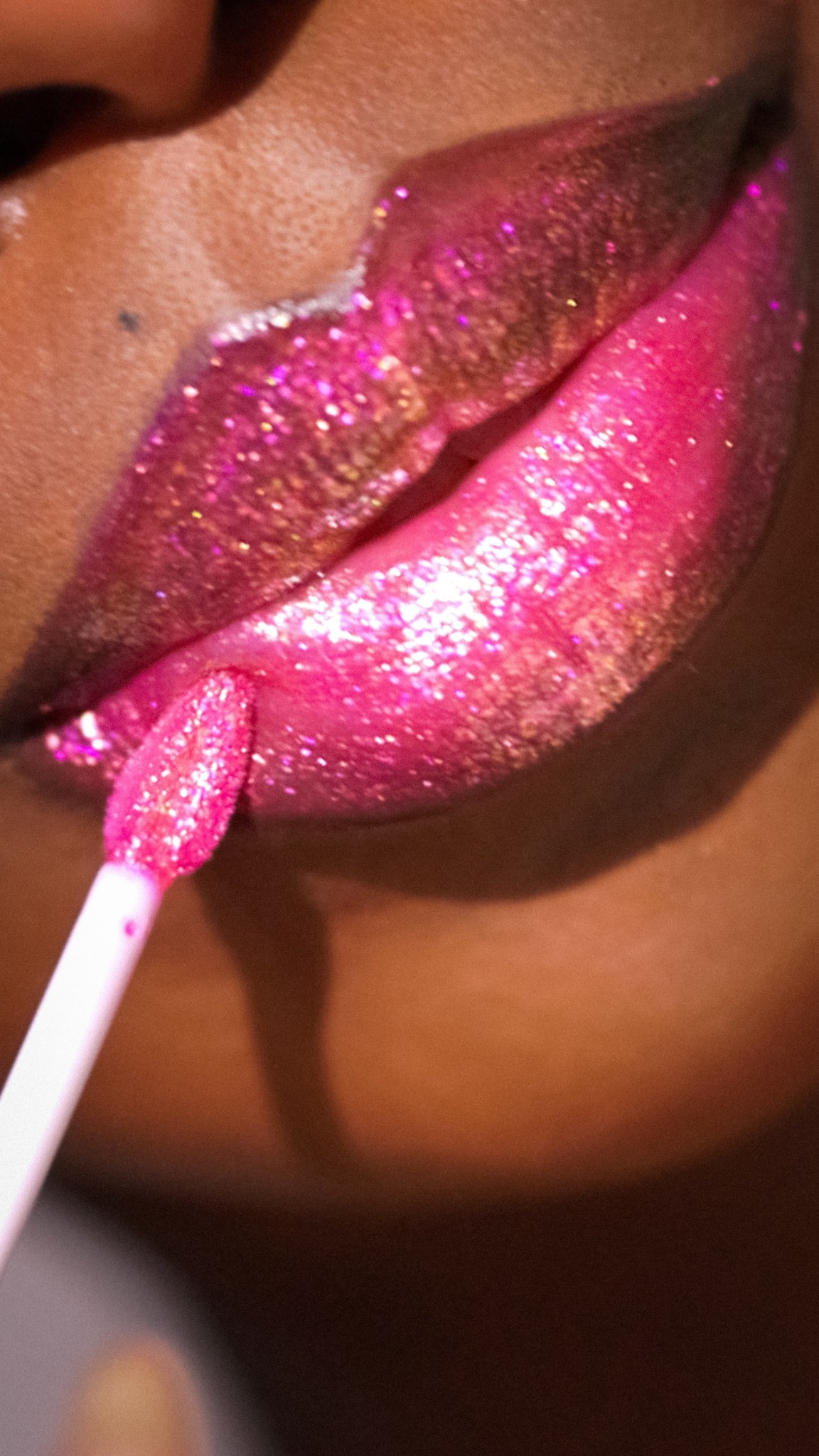 Pink sparkly Holographic lipgloss , perfect for festival season 💖

#LTKBeauty #LTKOver40 #LTKSeasonal