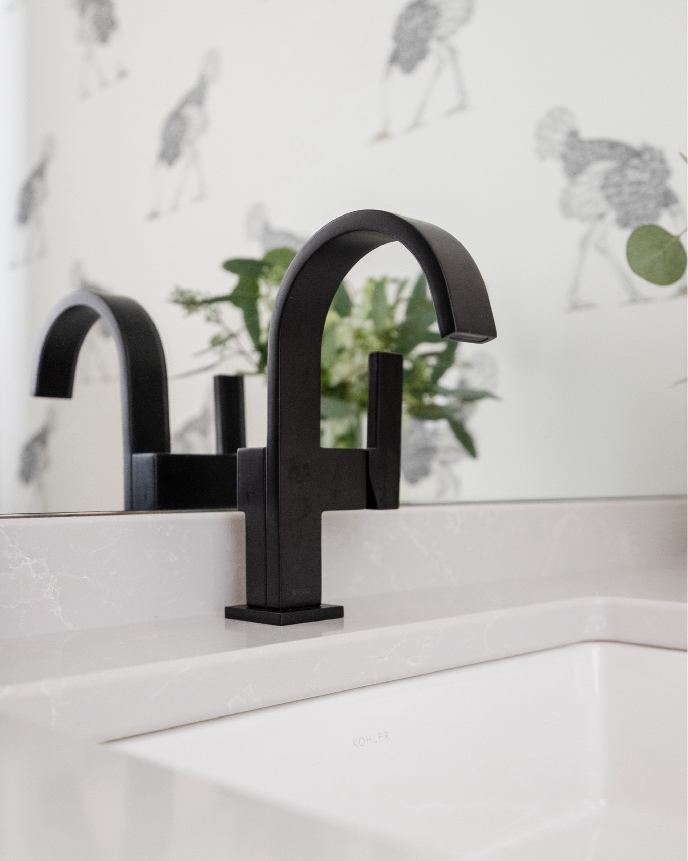 A small powder bath with a big impact. Shop these modern bathroom details! ➡️ Brizo matte black faucet, Kohler undermount sink, and the best selling heathered Rejuvenation hand towel.

#LTKHome