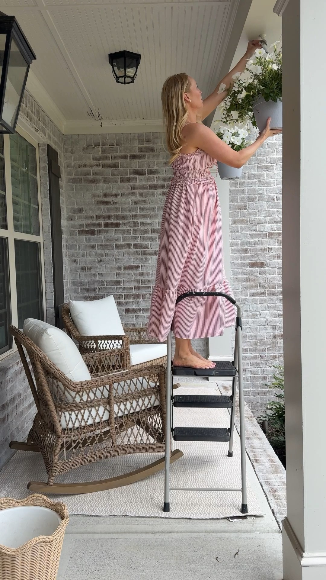 Finally found my annual white hanging petunias for the front porch! I just got these rocking chairs in and they are so comfortable, I can’t wait to rock a sweet little newborn in them this fall. The porch refresh is almost complete, just waiting on the side table and matching coffee table to get delivered! 

#LTKSummerEdit #LTKHome