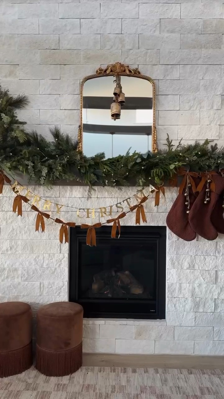 Never will be over this $30 target garland! Shop my fireplace mantle look here! 🎄✨🤍 

#LTKSeasonal #LTKHome #LTKHoliday