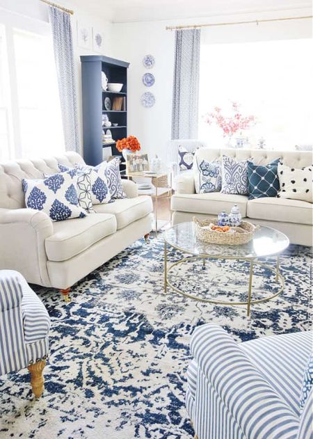 My fall living room decorated in blue and white with pops of color.

#LTKhome #LTKSeasonal #LTKunder50