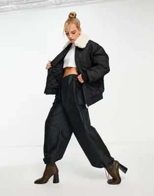 & Other Stories nylon bomber jacket with faux fur collar in black | ASOS (Global)