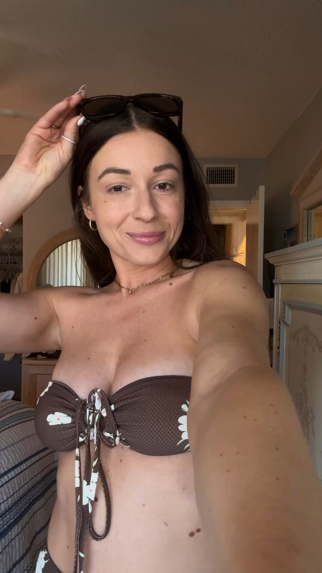 wearing a small top and bottom 🤎