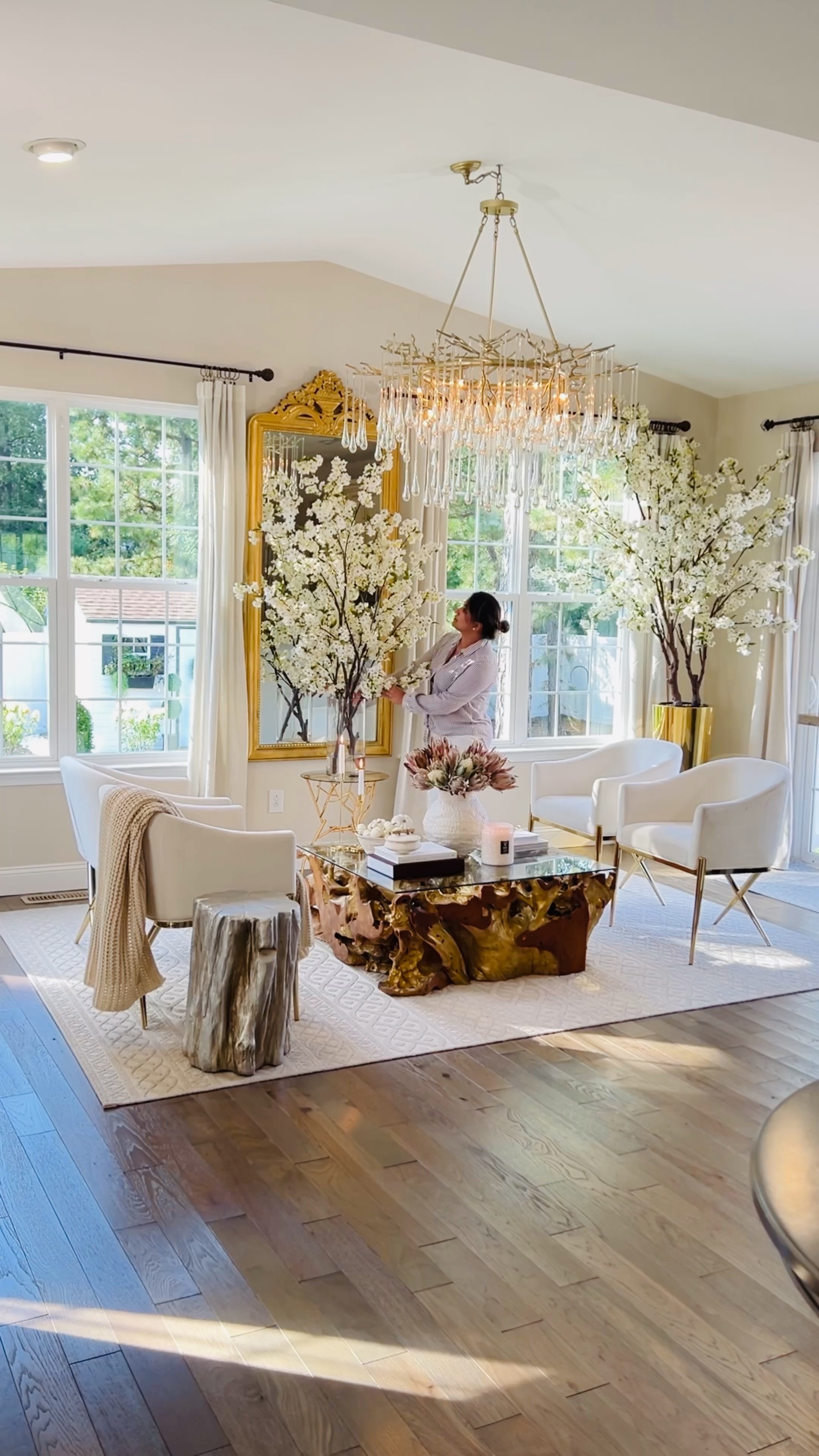 Shop my sunroom here! 
Teak coffee tables 
Coffee table books 
Velvet accent chairs 
Gold mirrors 
Vases 


#LTKSeasonal #LTKhome #LTKHalloween