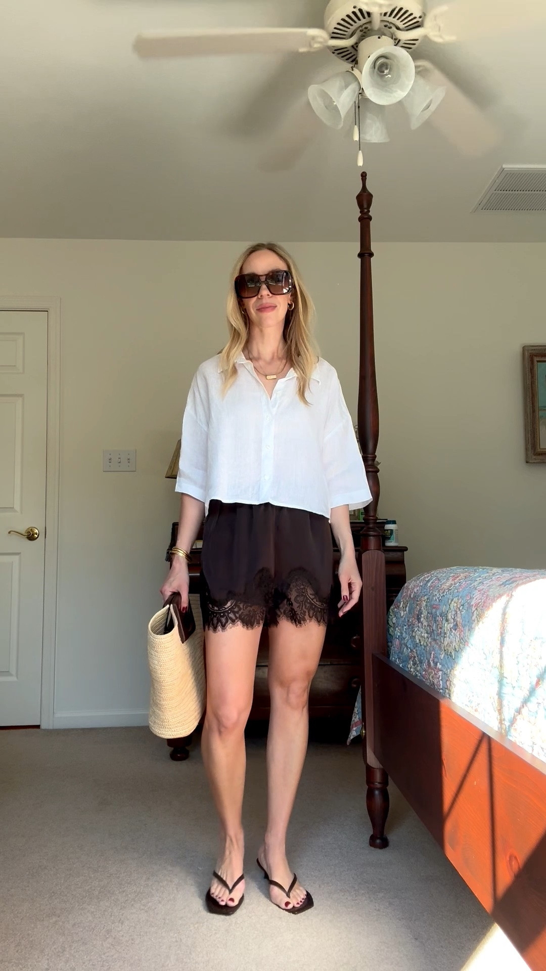 Styling lace shorts with oversized linen shirt, thong sandals and straw tote bag

#LTKSeasonal #LTKOver40 #LTKgrwm