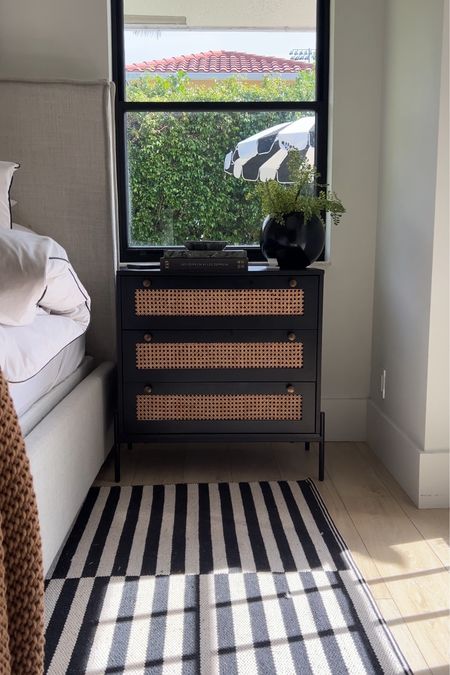 Bedroom decor 
Black nightstand striped rug 
Faux fern 
Nighstand decor 
Jewelry holder 

#LTKhome #LTKunder50 #LTKunder100