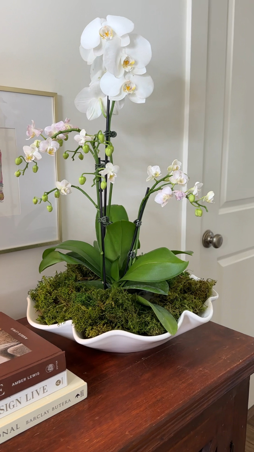 Ruffle bowl floral arrangement. This Ruffle pottery paired with a few orchids is timeless and super inexpensive 
. 

#LTKstyletip #LTKfindsunder50 #LTKhome