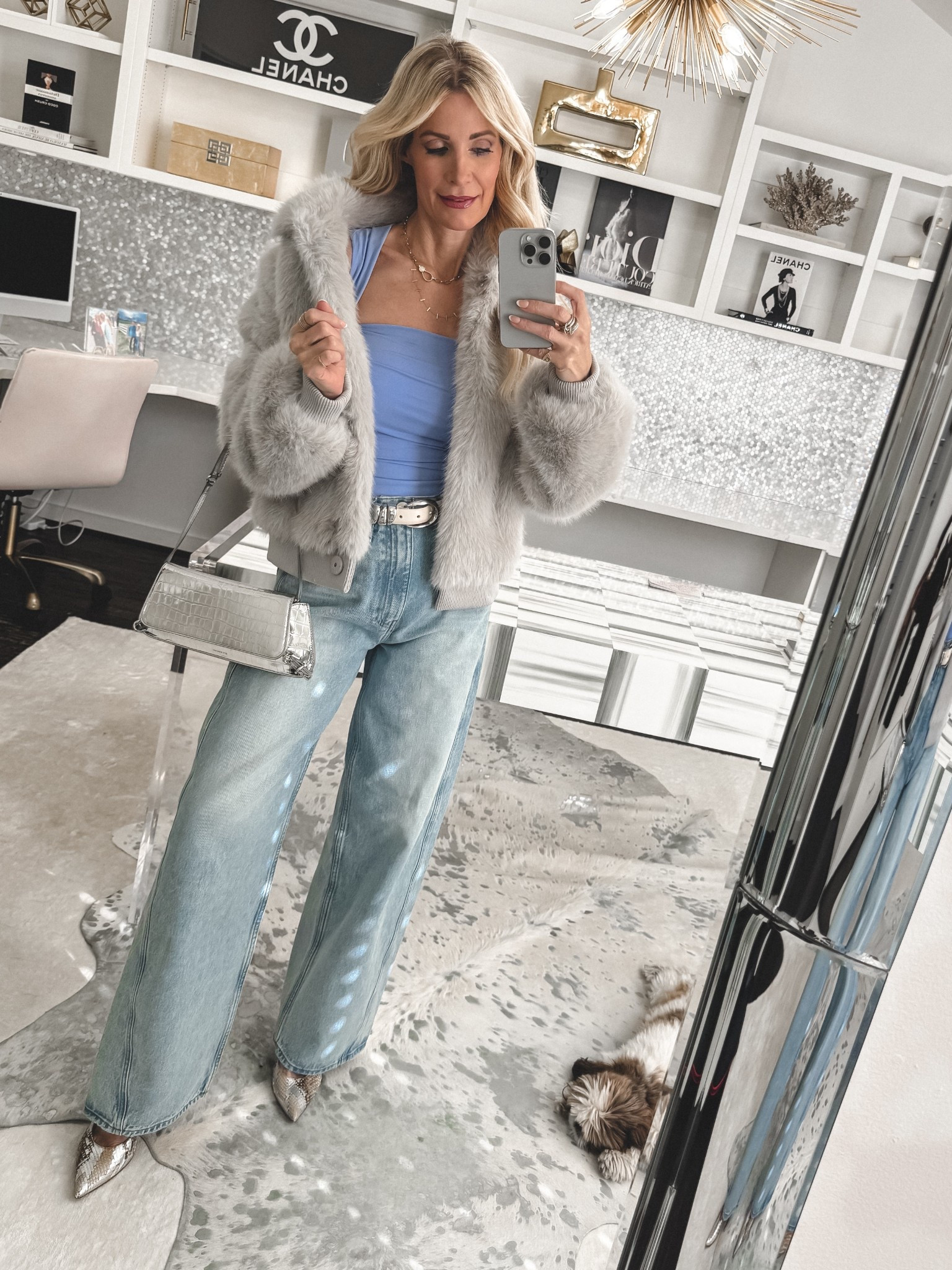 This gray faux fur coat is the ultimate winter glam layer and it’s 30% off right now 🙌 The Trina Turk Morris Coat instantly makes any outfit feel elevated, plus it’s warm, chic, and perfect for a night out or holiday season looks. I’m wearing an XS and it fits TTS. 

 #LTKSeasonal #LTKOver40 #LTKSaleAlert