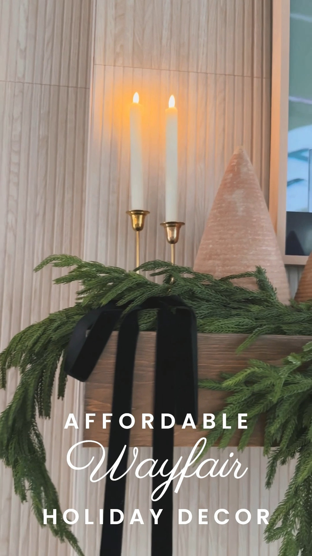Bringing Christmas magic into our home with affordable holiday décor finds from @wayfair ✨🎄 Everything here is budget-friendly, high-quality, and looks so beautiful styled throughout our home.

The faux lifelike garland is incredibly realistic — full, lush, and perfect for mantels, staircases, and entryways. And these faux flame taper candles with a remote add the prettiest warm glow without any mess or worry. Paired with pre-lit Christmas trees, velvet ribbon, brass candle holders, and festive accents… it all comes together for the coziest holiday look.

Linking all my favorite Wayfair Christmas décor on LTK!
#wayfair #wayfairpartner 🎄✨

#holidayhomedecor #christmasgreenery #fauxgarland #winterwreaths #christmascandles #cozyholidayhome #neutralchristmasdecor #budgetfriendlydecor #christmasinspo #holidaydecorideas #ad

#LTKHoliday #LTKSeasonal #LTKHome