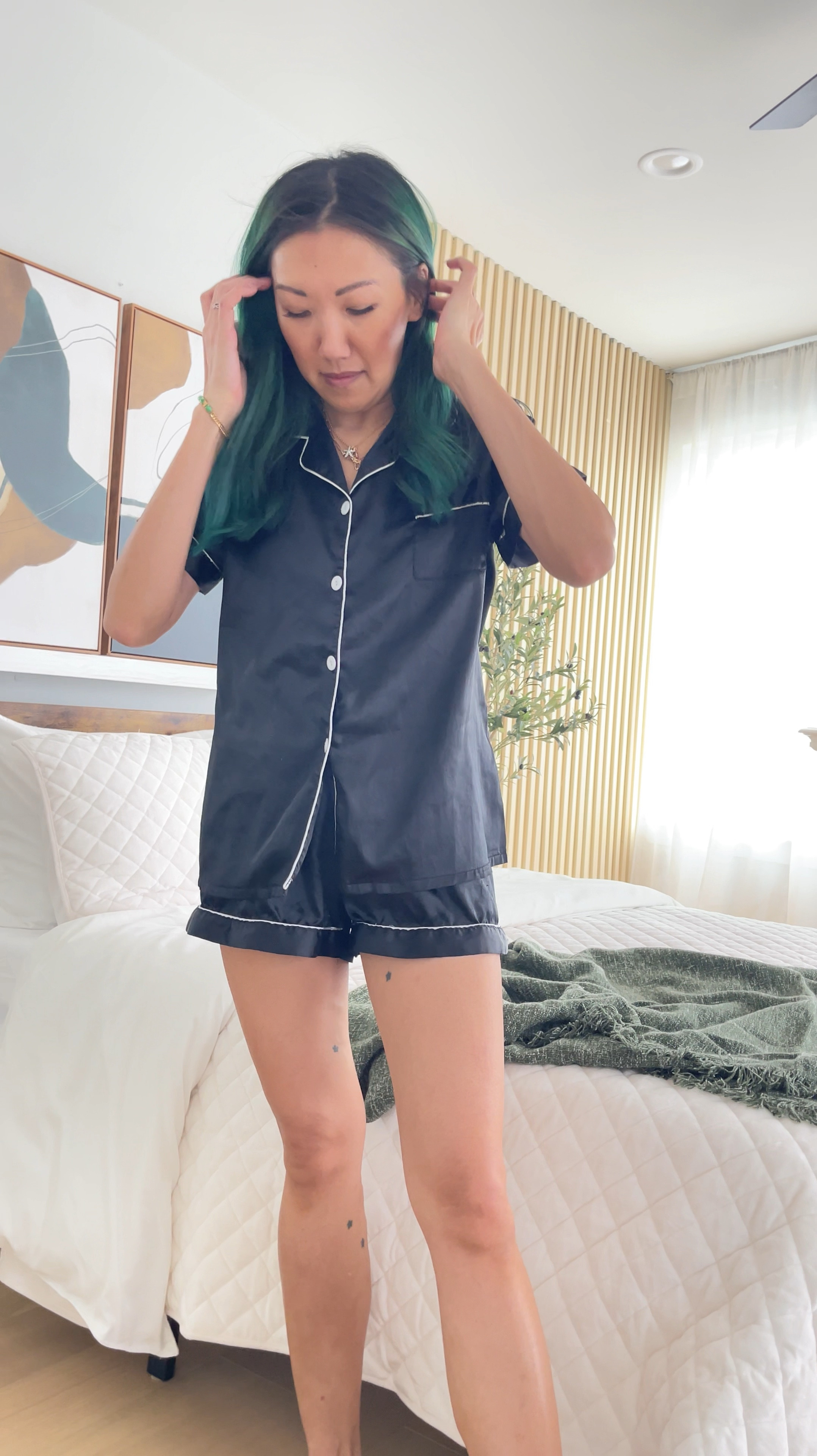 In 2025 I’m spending my weekend in pajamas, and who couldn’t use a new set of silky satin pajamas. I have been collecting silk pajama sets for each night of the week. 

Satin PJs, short sleeve button-up shirt and shorts PJ set

#LTKStyleTip #LTKFindsUnder50