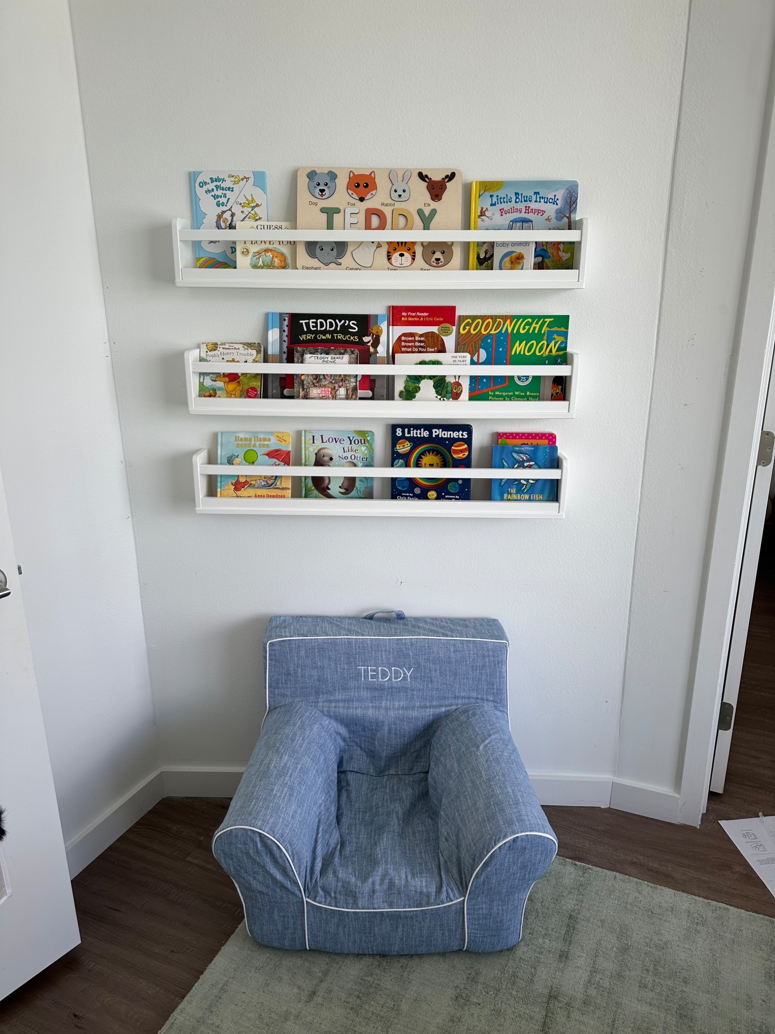 Teddy’s little reading nook! Chair is the Anywhere Chair from Pottery Barn Kids!

Chair details: 
Size - KIDS (2-6 YEARS OLD)
Color - CHAMBRAY
Font - PERS FUTURA
Font text color - WHITE