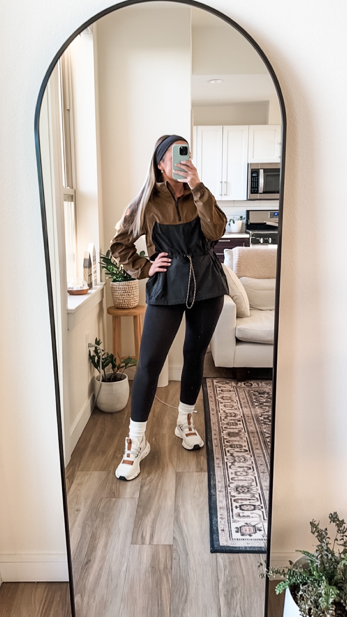 This windbreaker is the best purchase I’ve made. It converts itself into a belt bag - how cool is that?! Perfect for hikes and the Spring. 🤎🖤

#LTKshoecrush #LTKSeasonal #LTKfit