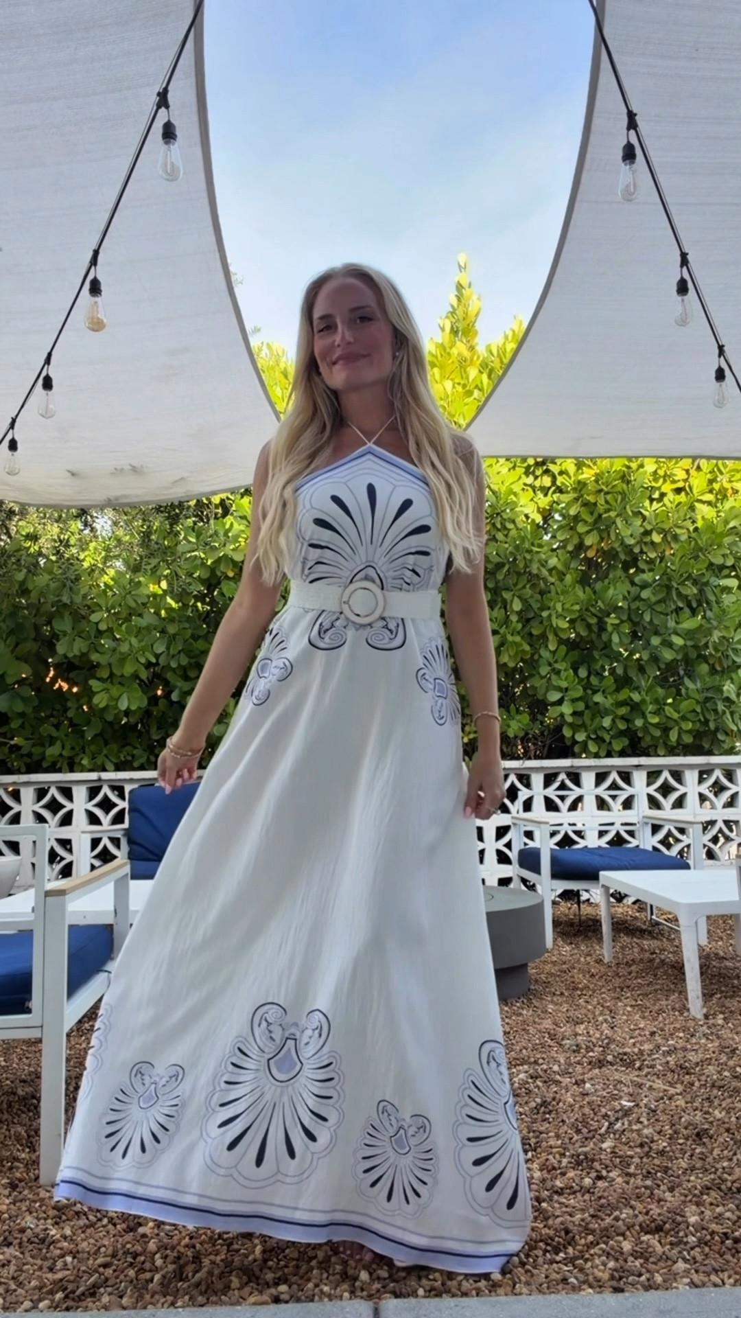 The most beautiful beach vacation dress! If you need the perfect vacation outfit, you need this dress. Runs a little large, so if between sizes you can size down. I am wearing a medium and a small would have been better. This dress is made of 100% cotton. It is a lovely lightweight linen fabric. 🦋 Use code LOVINGLIFE35 for 35% off! 🦋

The shape is beautiful on its own, but I like it even better with a belt. I paired it with white shell earrings, a white stretchy rattan belt and white strappy heels. I forgot to include my purse in the video, but will link it below.

#LTKdayinmylife #LTKgrwm #LTKootd
