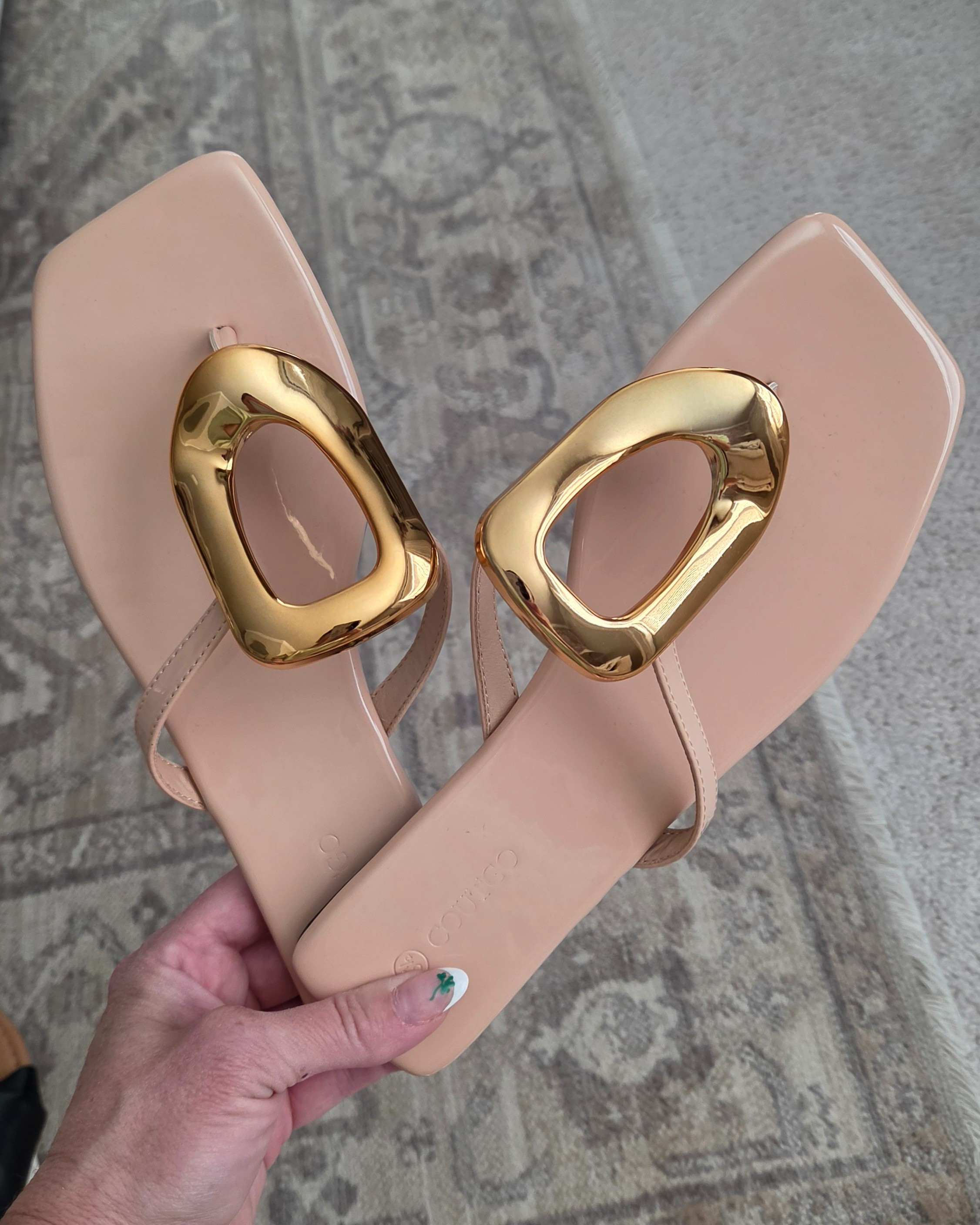 Get the Anthropologie aesthetic on a budget with these chic nude sandals featuring a bold gold accent. The square toe and minimalist design make them an essential for your vacation wardrobe.#vacationstyle #lookforless #springfashion #sandals

#LTKSeasonal #LTKTravel #LTKSwim