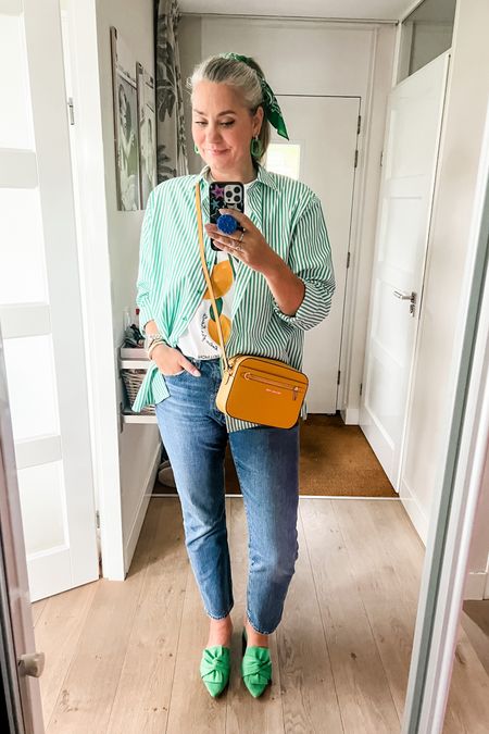 Ootd - Thursday. A geeen and white striped buttondown shirt (tall specific, part of a set), over a t-shirt with Sicily lemon 🍋 print, blue Levi’s 501 jeans, a green bandana and a secondhand yellow Michael Kors crossbody bag. 





#LTKnederlands #LTKspring #LTKeurope