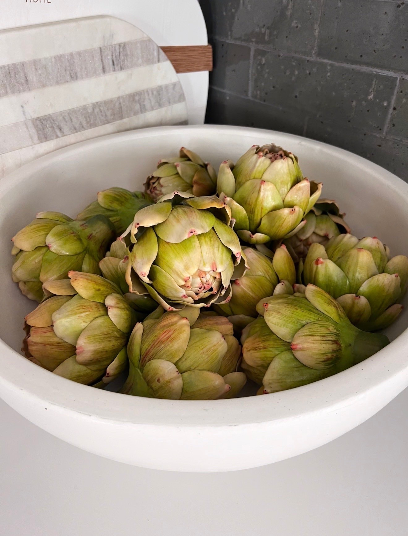 I love incorporating organic elements throughout our home to bring in warmth and texture, and these faux artichokes are one of my favorite styling pieces lately. They add such a soft collected feel styled in a bowl on kitchen counters, coffee tables, or open shelving and instantly make a space feel layered without trying too hard.

faux artichokes, neutral home decor, organic home styling, decorative bowl fillers, coastal traditional decor, kitchen styling ideas, amazon home finds, layered neutral interiors, timeless home decor, collected home aesthetic, Girl on the Hudson

#LTKHome #LTKfoodie
