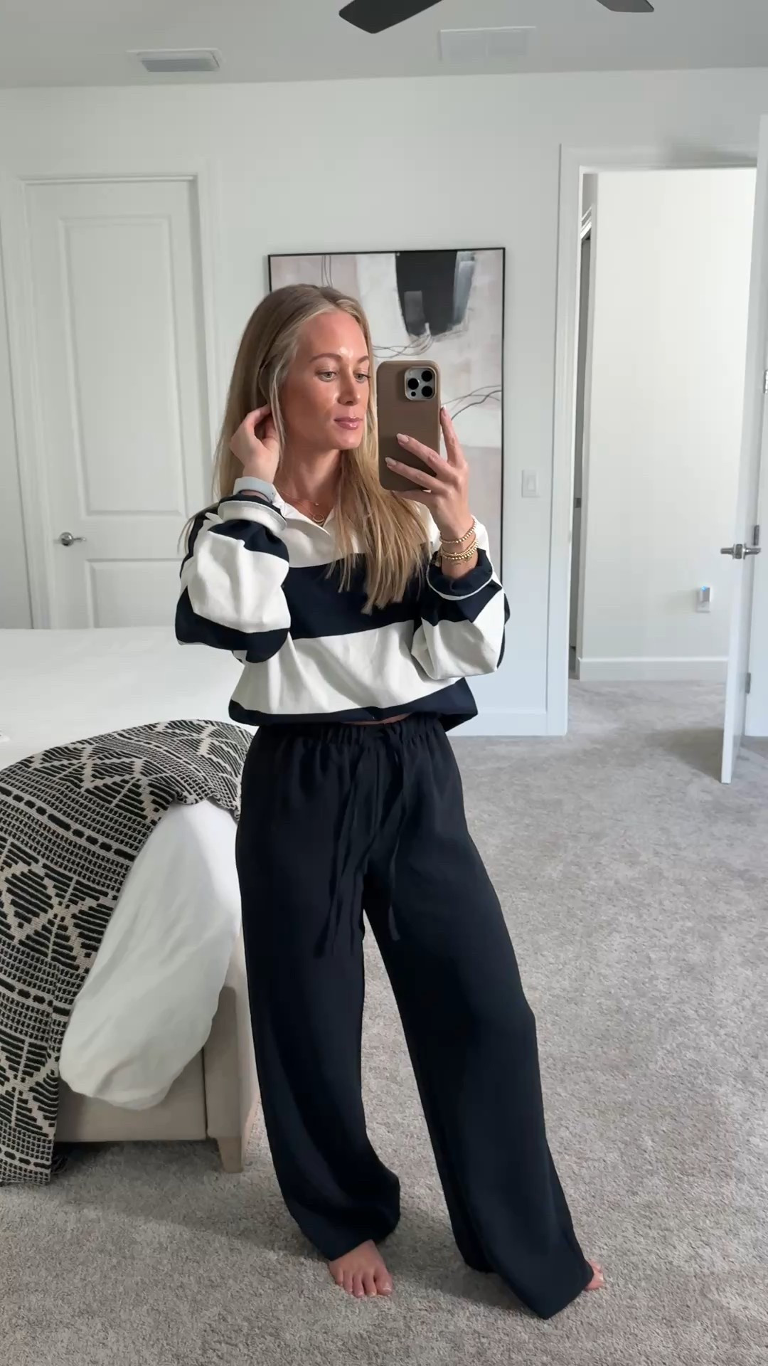 OOTD wearing aritzia lodge pants and striped polo top