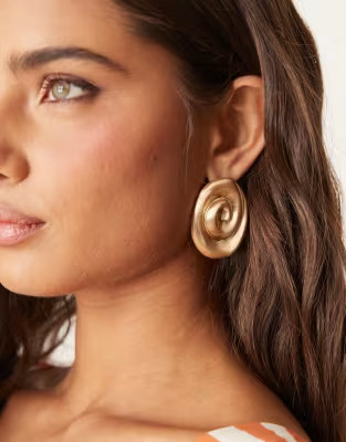 ASOS DESIGN stud earrings in swirl design in brushed gold tone | ASOS (Global)