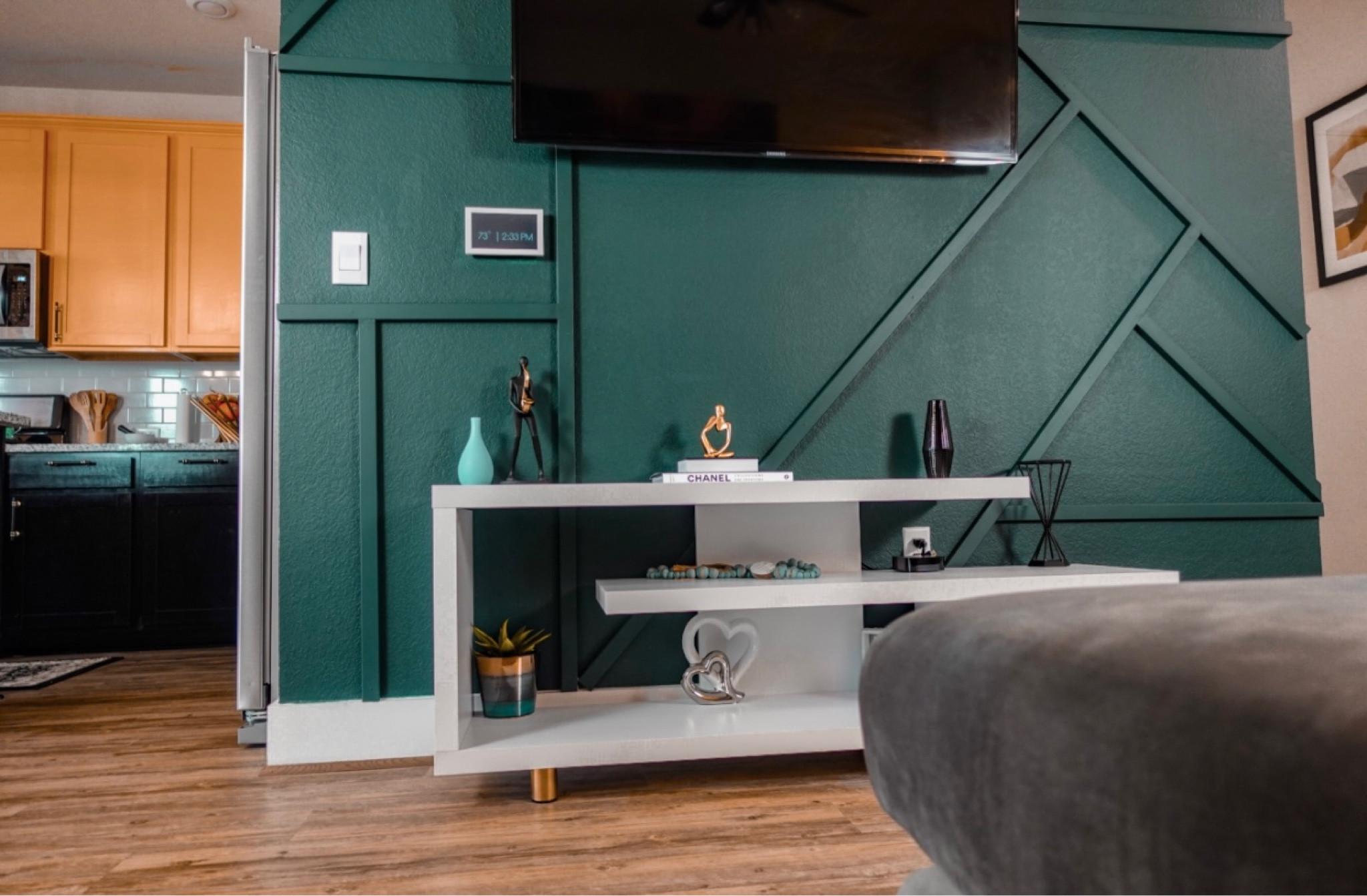 Check out this tv stand with a bold green accent wall.

#LTKstyletip #LTKhome #LTKsalealert