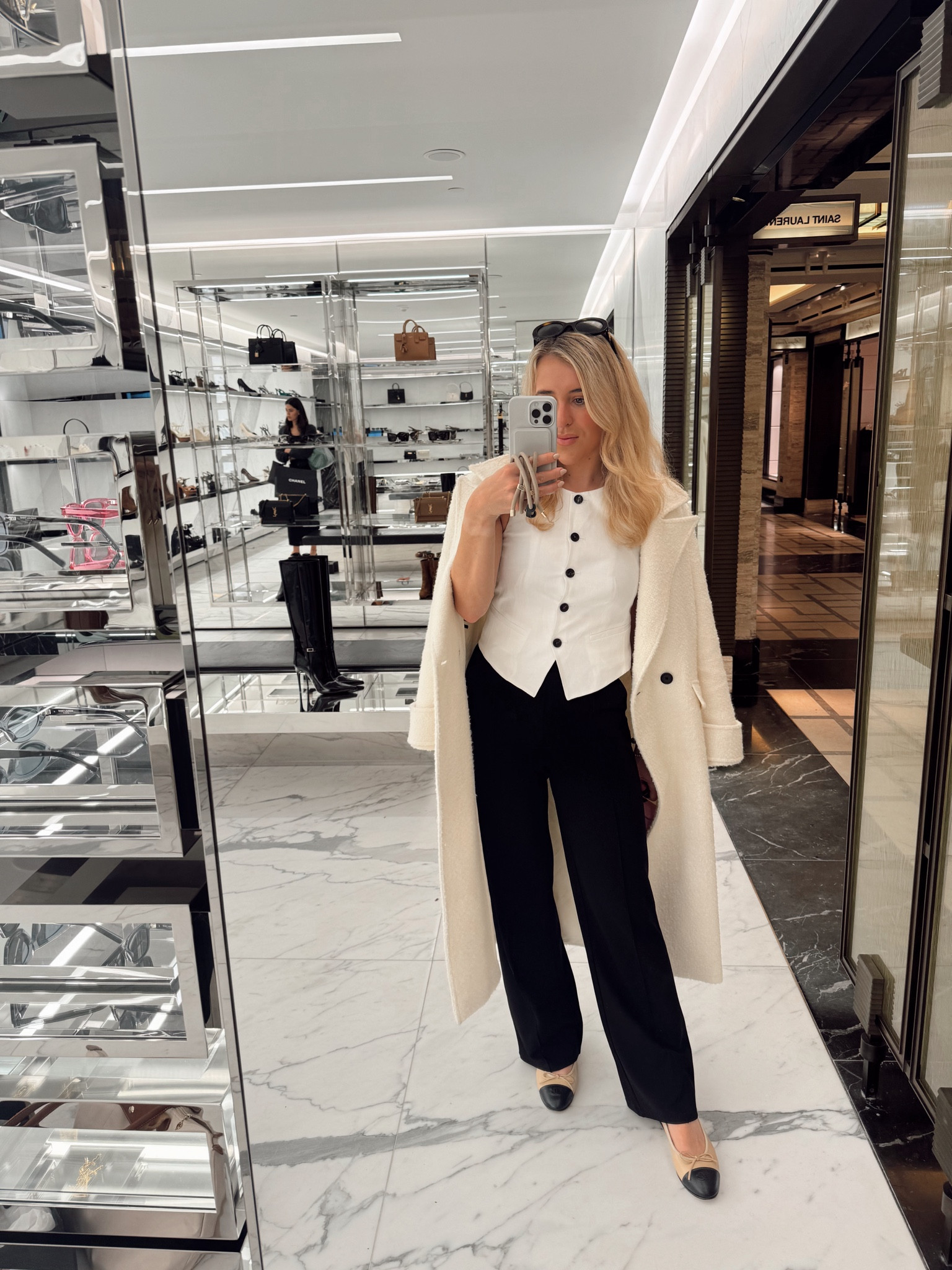 Chanel flats - Chanel ballet flats I’ve put some more affordable Chanel style flats here for you - H&M trousers - H&M
Pants - tailored pants I wear XS - coat is on sale size down I got size 6 - all saints coat - spring outfit - waist coat - waist coat comes up very small I got a uk 8 - karen millen waist coat - karen millen clothes - spring outfits - spring outfit ideas - Chanel shoes - celine sunglasses - workwear - work outfit  - all saints jacket - white coat - black trousers - tailoring 

#LTKworkwear #LTKsalealert #LTKstyletip