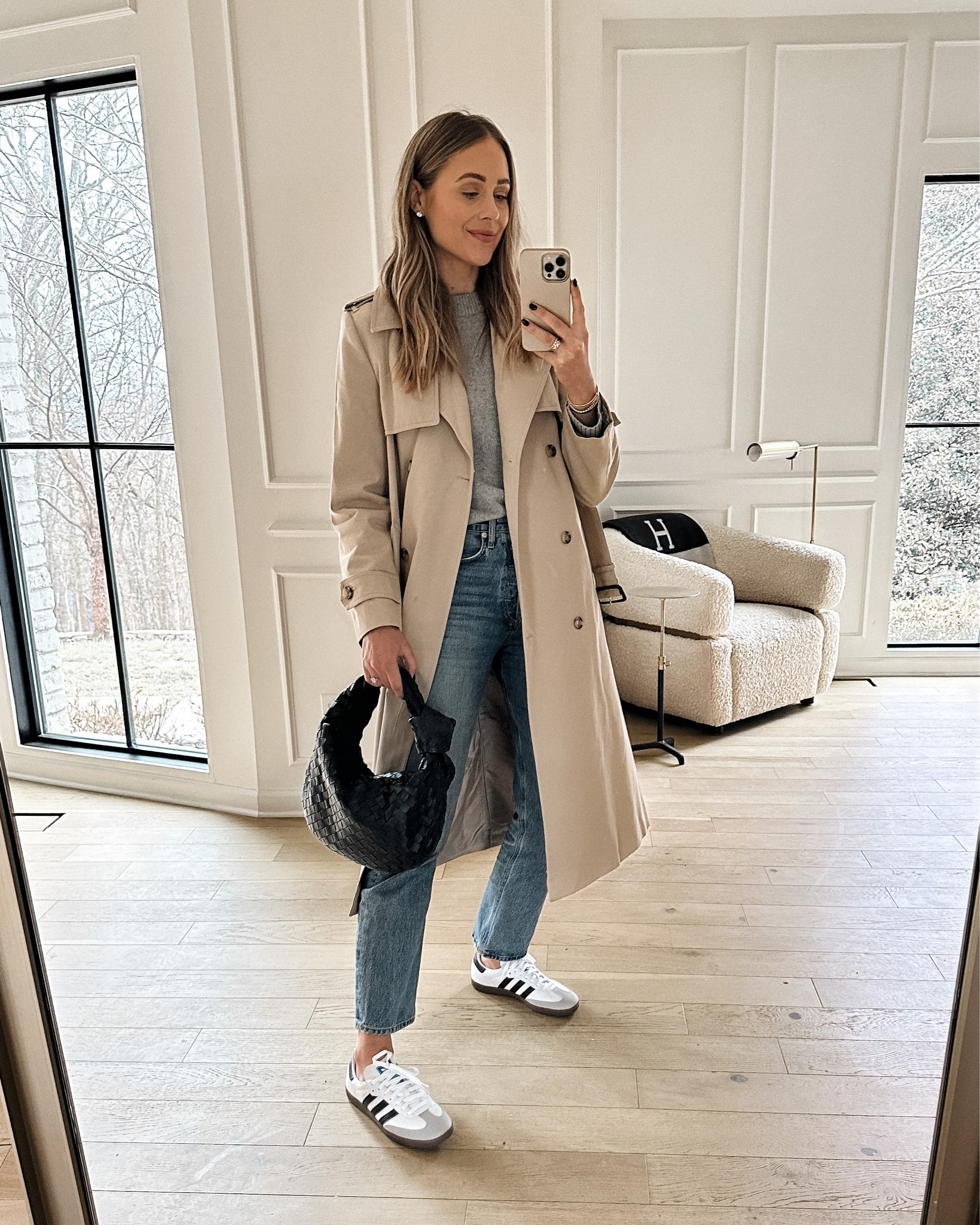 Fashion Jackson wearing long trench coat (small) Jenni Kayne grey sweater (XS - JACKSON15 discount) AGOLDE jeans, adidas samba sneakers, bottega veneta bag #fashionjackson #dailyoutfit #trenchcoat #sneakers #jeans 

#LTKstyletip #LTKunder100 #LTKshoecrush
