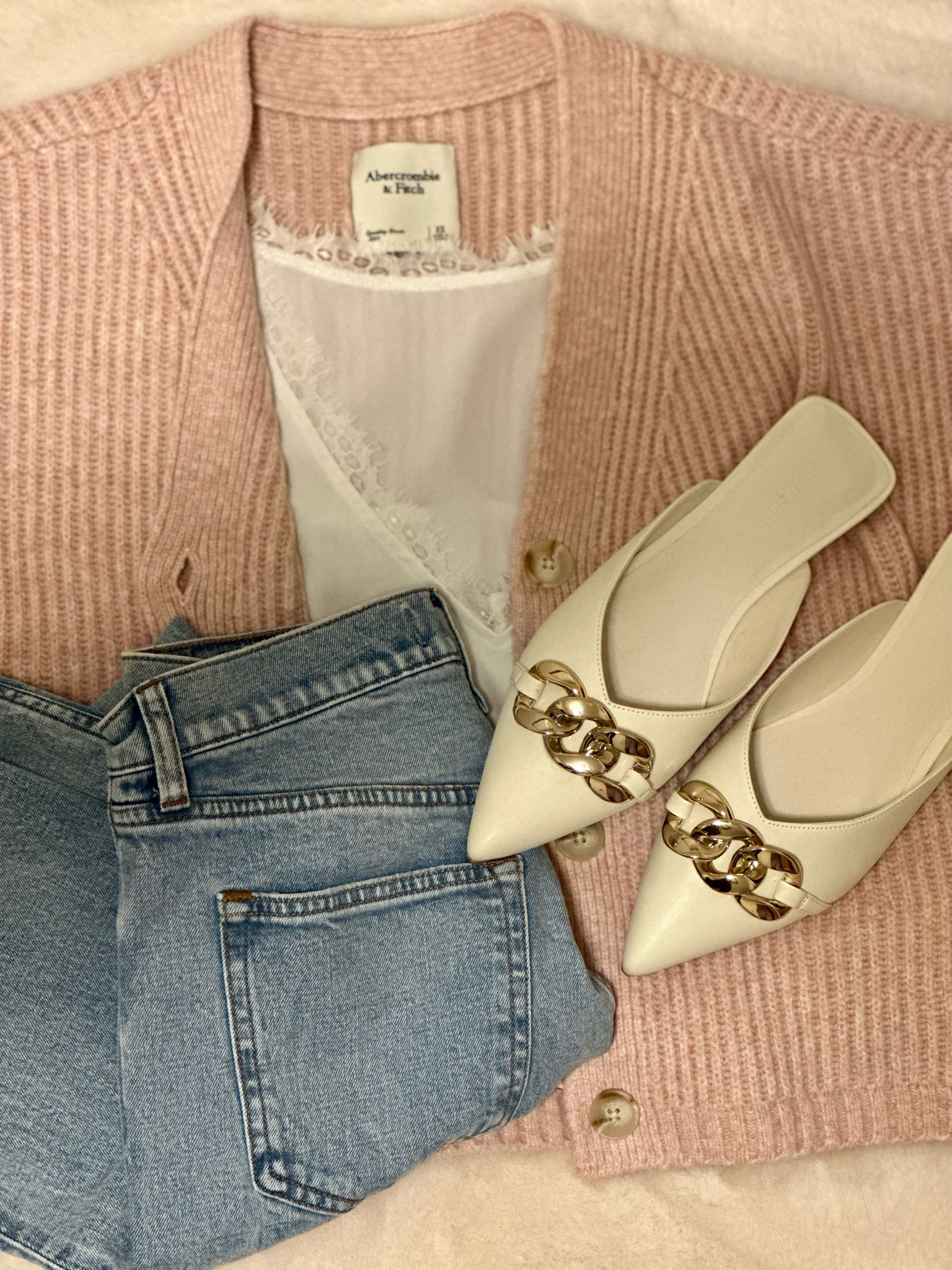 This blush pink super soft cardigan goes perfectly with the light wash denim ankle straight jeans (both from Abercrombie). Add a white lace trimmed top & white mules for a classy fall outfit! All are linked below. 🤍

Follow @jenniferxherron for more inspiration ✨

#LTKfindsunder100 #LTKstyletip #LTKfindsunder50
