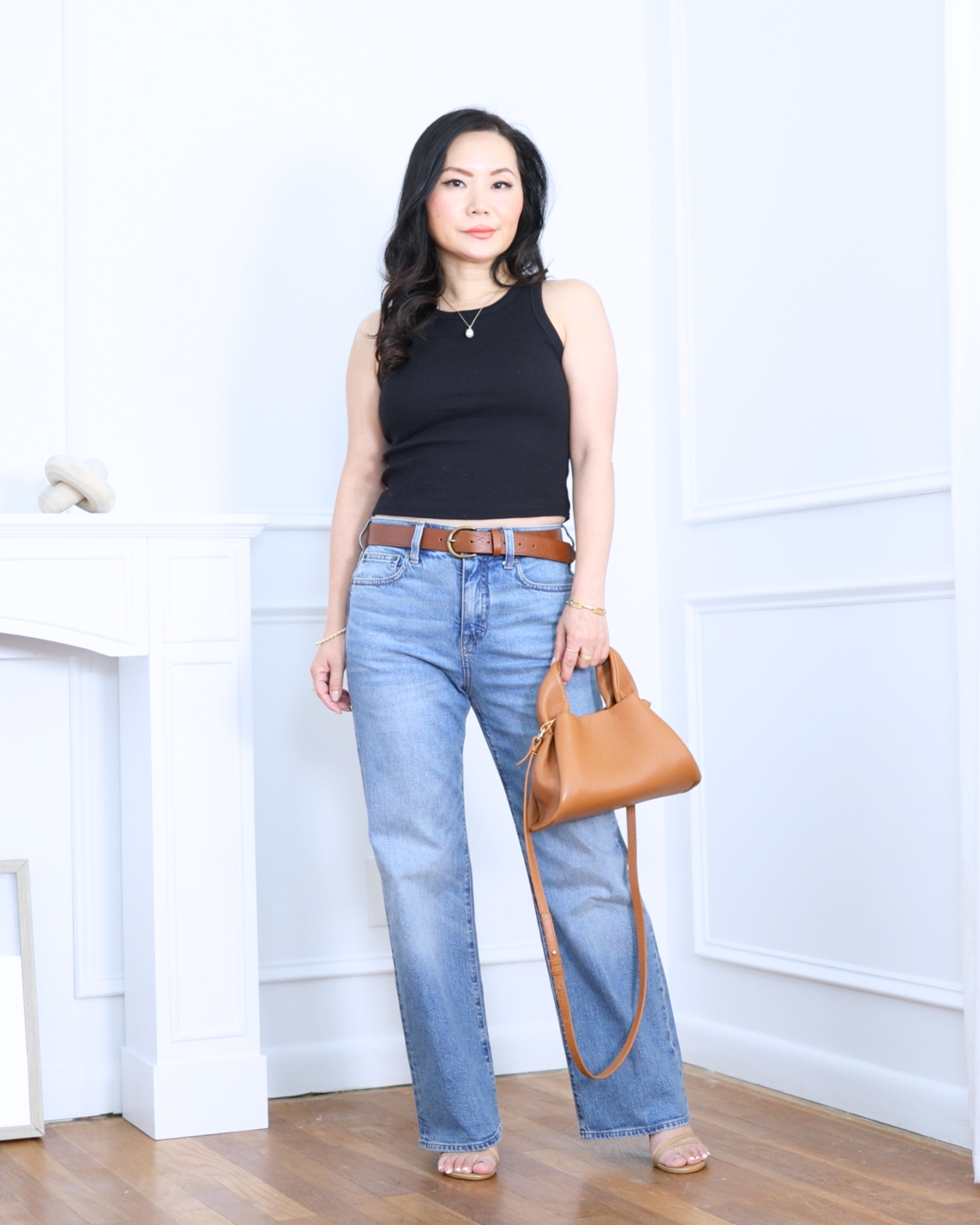Ribbed cropped bra top from Uniqlo styled with J.Crew kick-flare jeans — an easy mix of casual and flattering that feels effortlessly cool for everyday wear. I'm 5'2, wearing size S. 

 #LTKootd #LTKOver40 #LTKPetite