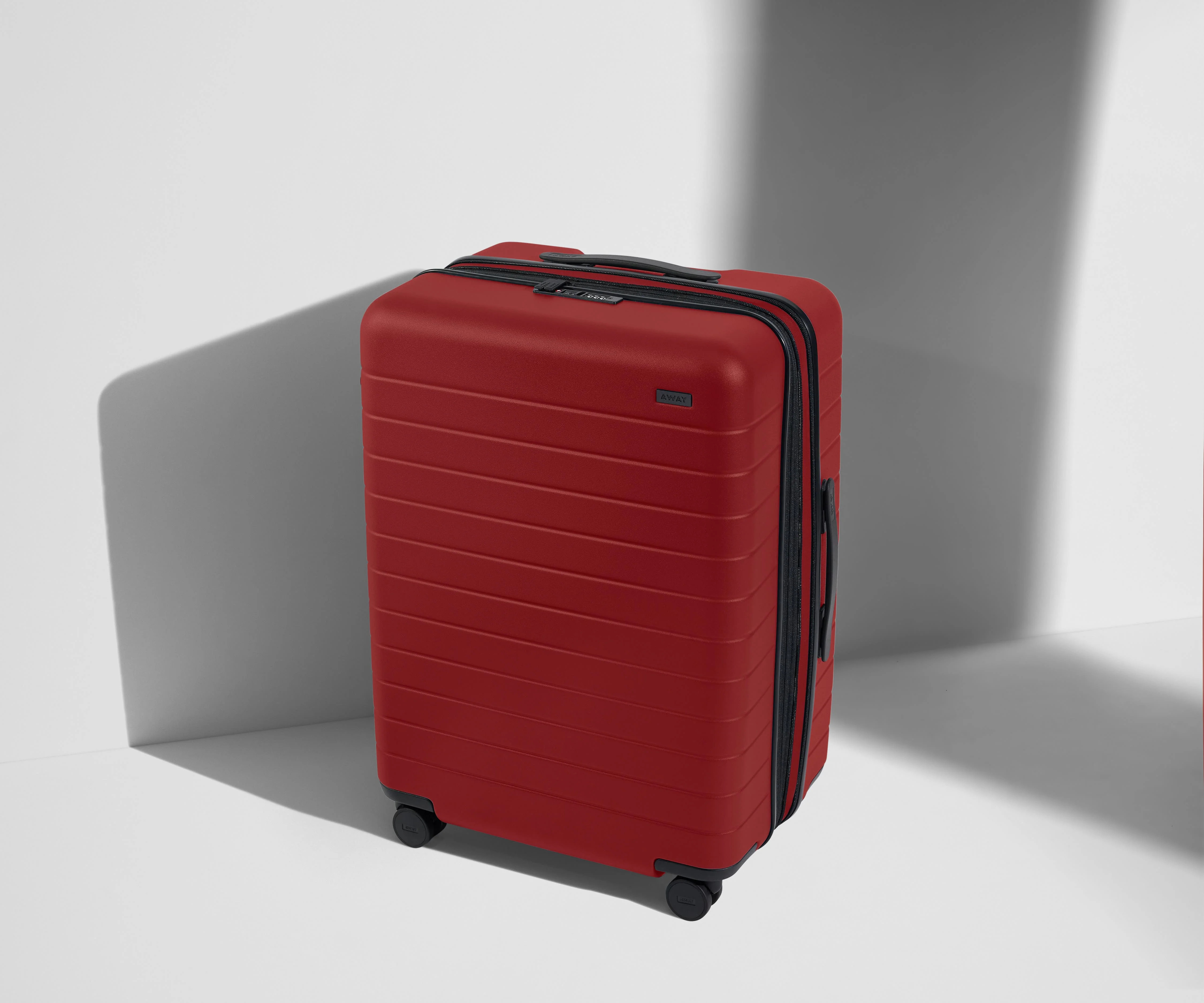 Expandable Medium Suitcases: Tango Red | Away | Away