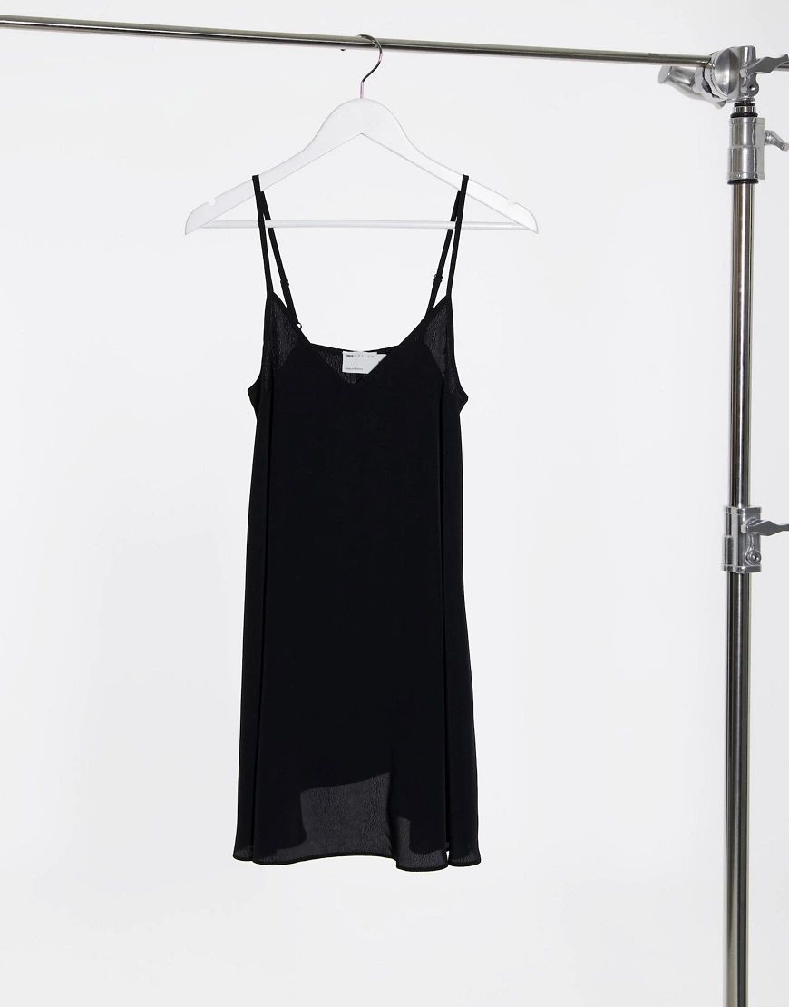 ASOS DESIGN v neck swing mini slip dress in black | ASOS (Global)