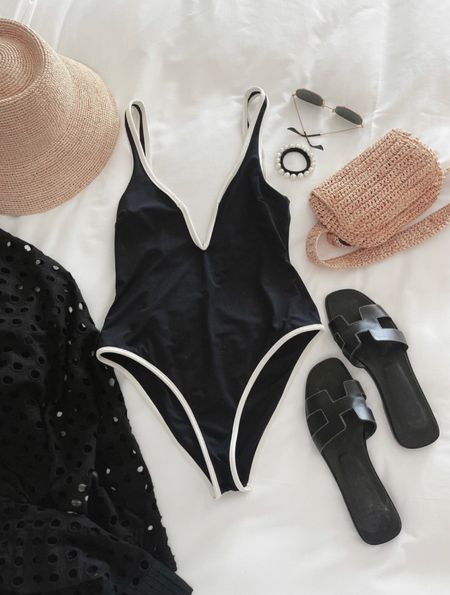 Simple and chic black swimsuit outfit for summer. #swim #beachvacation

#LTKSwim #LTKSeasonal