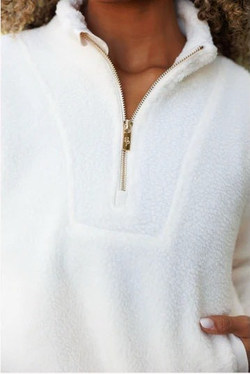 Cream Sherpa pull over with gold hardware, front pocket 


#LTKHoliday #LTKGiftGuide #LTKCyberWeek