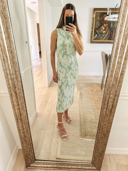 Dresses on sale 30% off right now! This crinkled textured pastel green one that’s perfect for all your spring events and vacation on sale for $24.50! 

#LTKsalealert #LTKunder50 #LTKstyletip