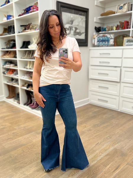 Flare leg Jeans. These have stretch, if in between sizes,  go down ❤️

#jeans #springoutfit #flareleg #sustainablefashion 

#LTKfindsunder100 #LTKover40 #LTKstyletip