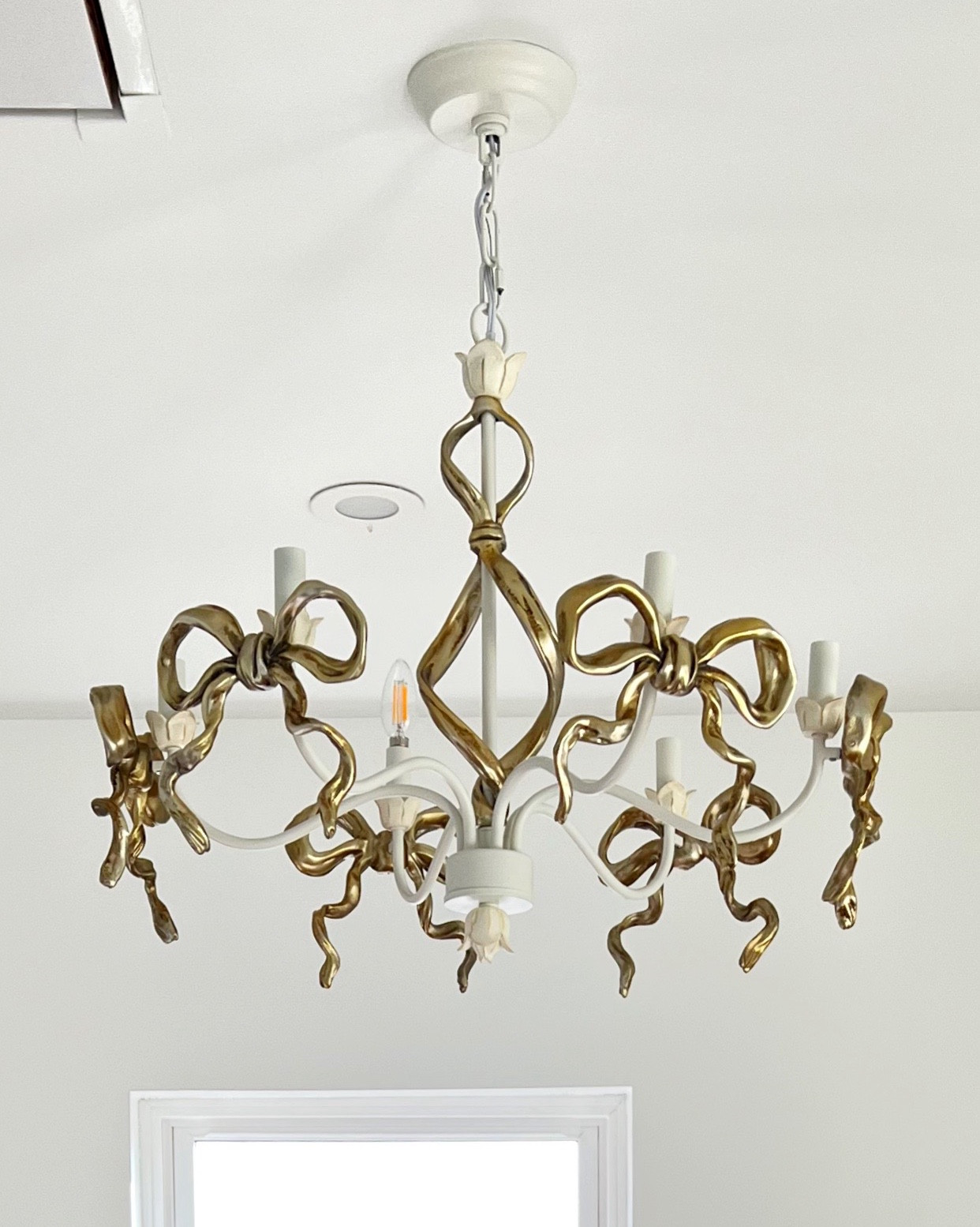 The cutest bow chandelier for our future closet space! 

#LTKFamily #LTKStyleTip #LTKHome