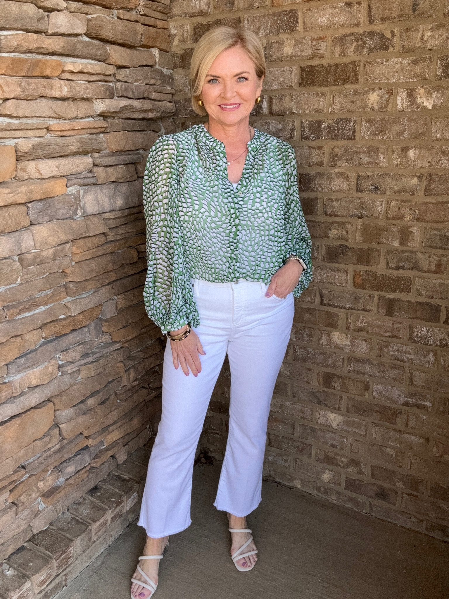 👖 White jeans are a spring & summer staple! These no-stain white jeans from Chico's are carefree because they resist water-based stains! Plus, they're SO comfortable with amazing stretch. Wearing them here with a fresh, green abstract print blouse & lucite heel sandals! Size 0 jeans, Small blouse. 

Jeans
White denim
Spring outfit
Sandals
Petite
Over 50


#LTKstyletip #LTKover40 #LTKshoecrush