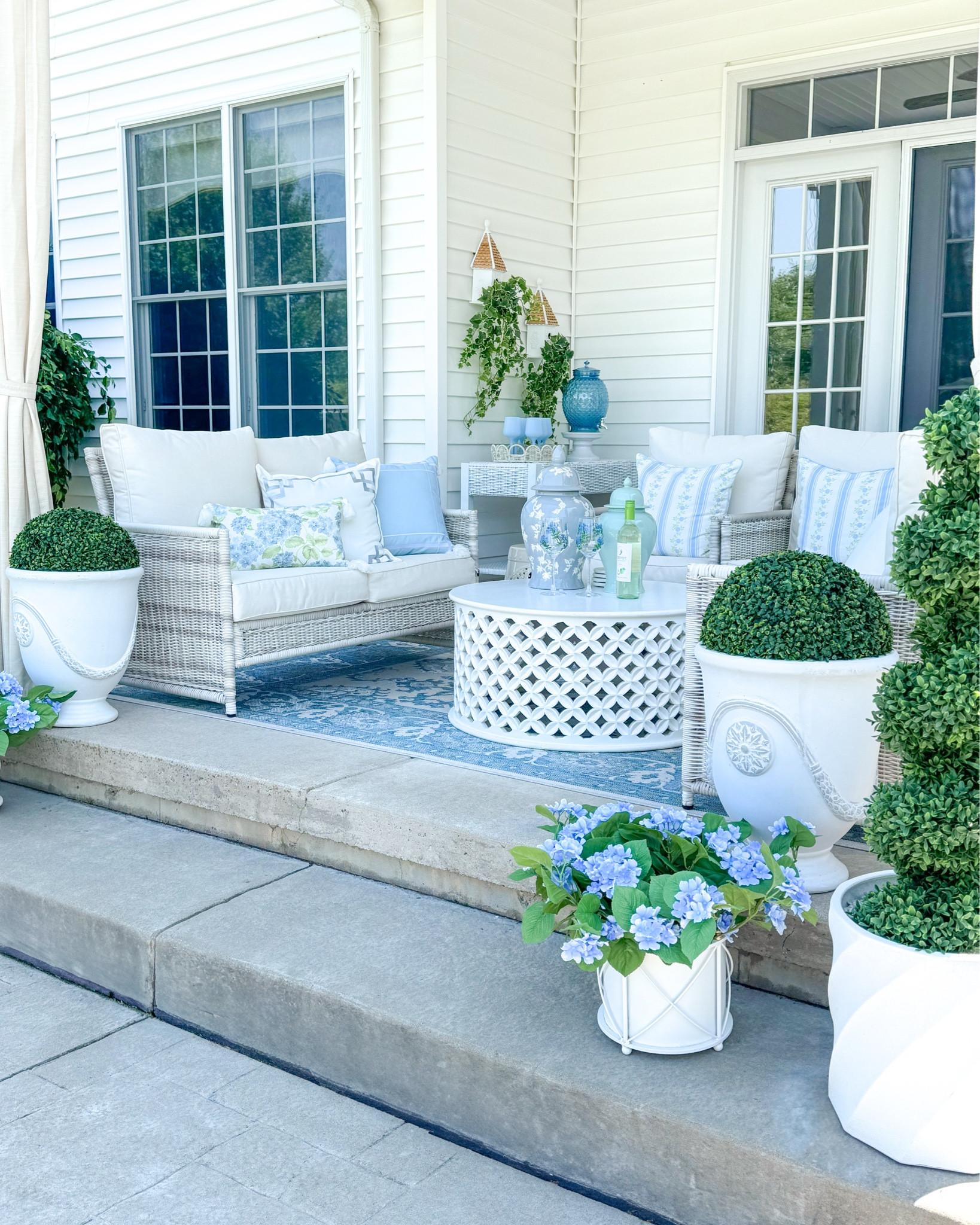 Summer patio refresh! Serena and Lily on a Walmart, Amazon and Wayfair budget!

Blue and white home, blue and white decor, coastal decor, outdoor space, blue hydrangeas, Anduze planter, white planter, white coffee table, outdoor pillows, Amazon finds, Walmart finds, blue outdoor rug, boxwood ball, boxwood topiary, hydrangea bush, faux florals, blue ginger jar, green ginger jar, white patio furniture, woven furniture, rattan, wicker furniture, outdoor living, blue and white pillows 

#LTKSeasonal #LTKHome #LTKFindsUnder100