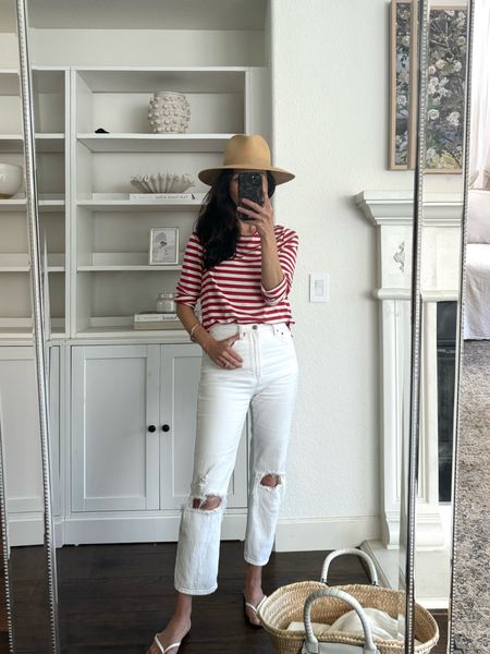 1. Janessa Leone packable sun hat. Great for travel  Wearing a medium. On sale!
2. Red and white striped cotton tee. Mine is Amour Vert. I’m also linking an alternative one in case mine is out. 
3. Abercrombie ultra high waisted ankle jeans. Mine are the “white destroy”, but they come in several other washes which I’m linking.  True to size. Wearing my normal size 25. 
4. White leather sandals from J.Crew. 
5. Chloe bag in this raffia and white leather. 

4th of July outfit 
Patriotic outfit 
Best sun hat 

#LTKSaleAlert #LTKOver40 #LTKTravel