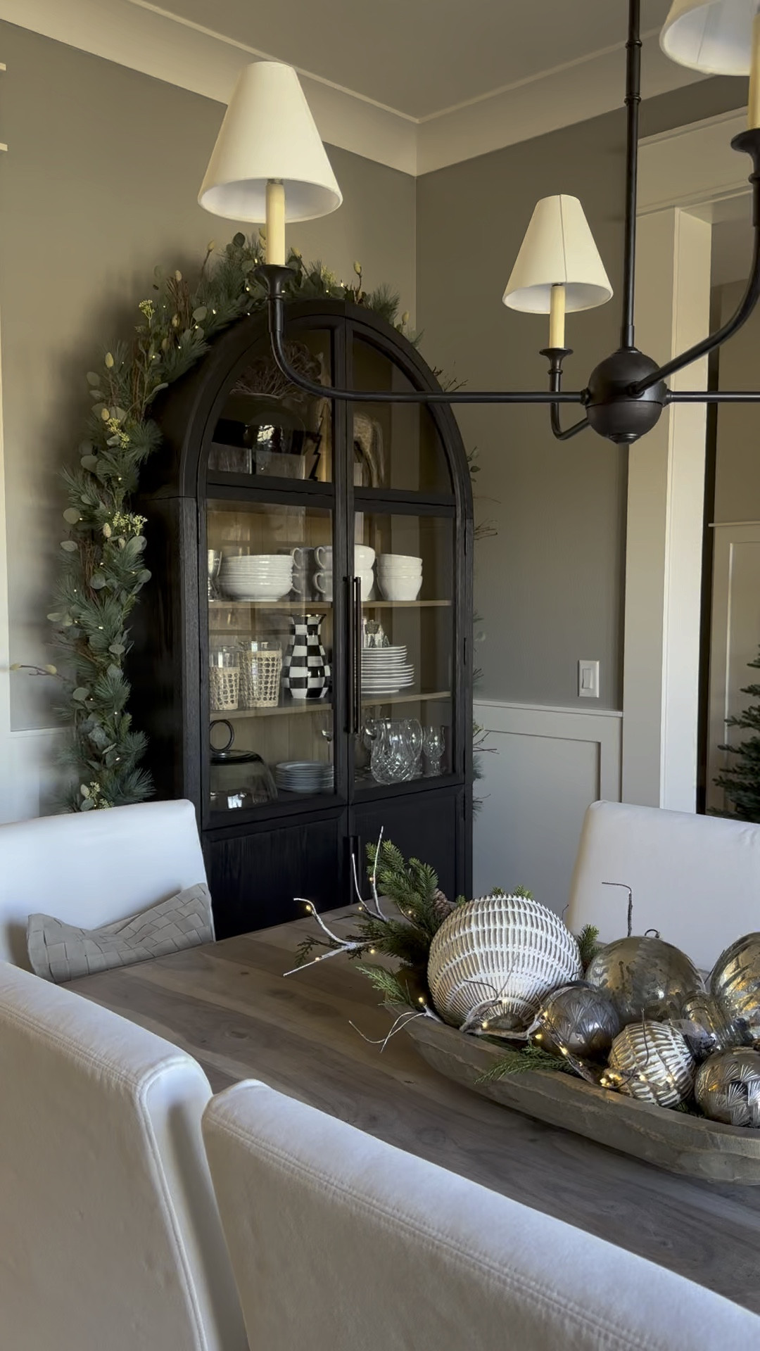 Dining Room Arched Black Cabinet | ornament dough Bowl | chandelier | modern organic | holiday home | entryway 

#LTKHoliday #LTKVideo #LTKhome