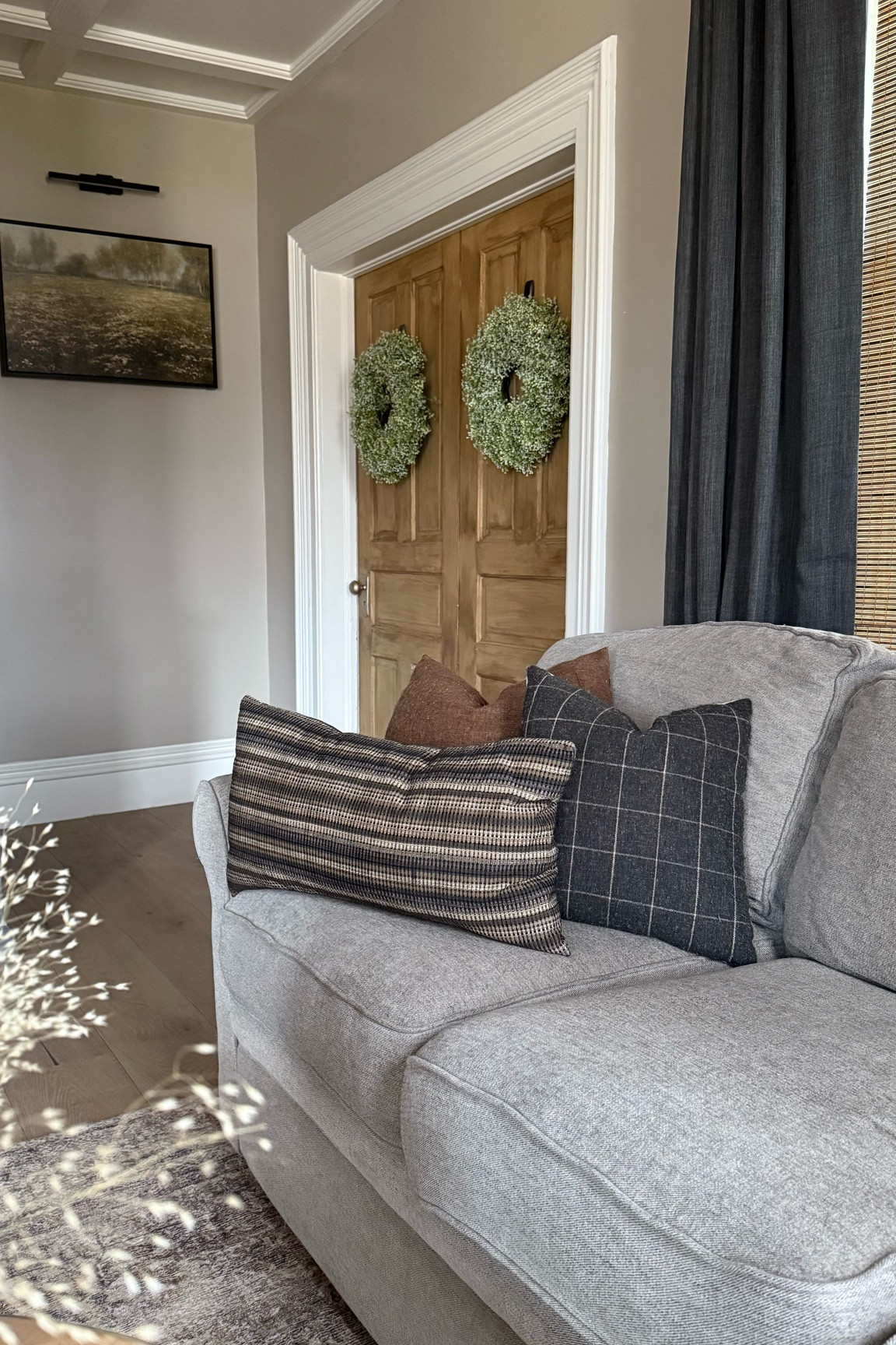 Like my style? 
Be sure to check out the Product Tab in my LTK Profile to find all of my Modern Farmhouse Living Room Recommendations!
While you’re there, you can use the search bar to search for things like: Spring Wreaths, Throw Pillows, Coffee Tables, Vases, etc.
Or you can search for more specific items such as: Solid Wood Coffee Table, Artisan Vase, Brown Throw Pillow Covers, Plaid Pillow Covers, etc.
Don’t forget to check out more of my favorite Home Decor Accessories, which I’ve conveniently categorized in folders called ‘Product Sets’

For more home inspiration, follow @elevatedneutrals on IG & Pinterest!

#LTKSeasonal #LTKHome