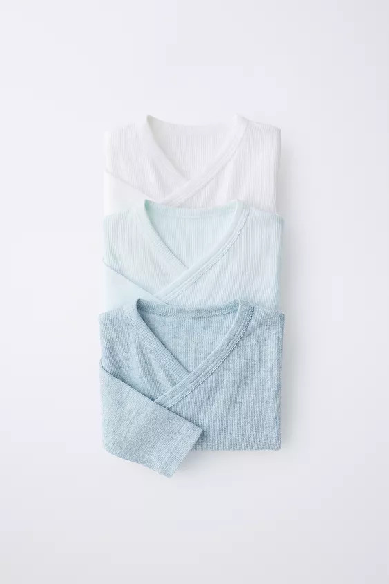 Pack of three ribbed bodysuits with a kimono collar and long sleeves. Featuring a crossover front... | Zara UK