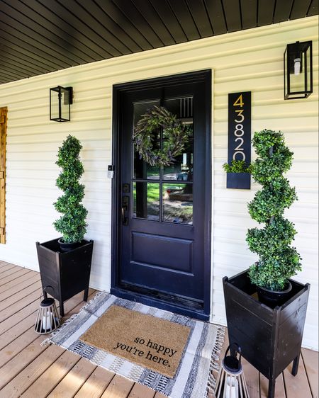 Front Porch Makeover with budget friendly finds: doormat, rug, planter box, artificial tree, address sign, lanterns, front door wreath 

#LTKSeasonal #LTKHome #LTKStyleTip