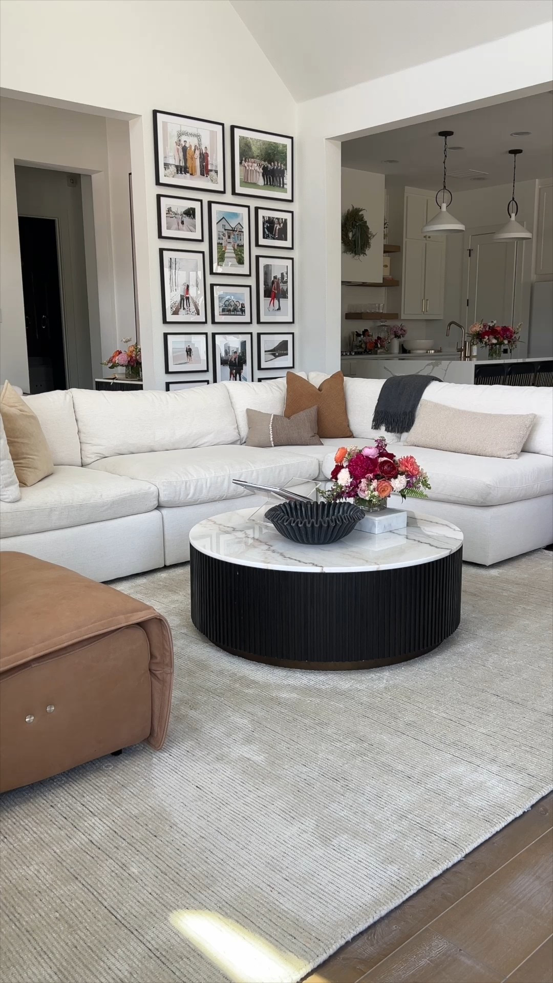 Cozy clean simple living room with the best white sectional sofa! We love our Arhaus Beale sofa with crypton fabric that is so easy to care for! Love our reeded wood and marble coffee table that grounds the room and adds a layer of dimension  

#LTKHome