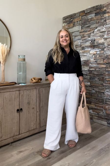 Business outfit/ workwear/ office outfit 
White trousers, black tailored shirt / universal standard 
Black Vince Camuto bag, Amazon bag, nude sandals. 



#LTKcurves #LTKitbag #LTKworkwear