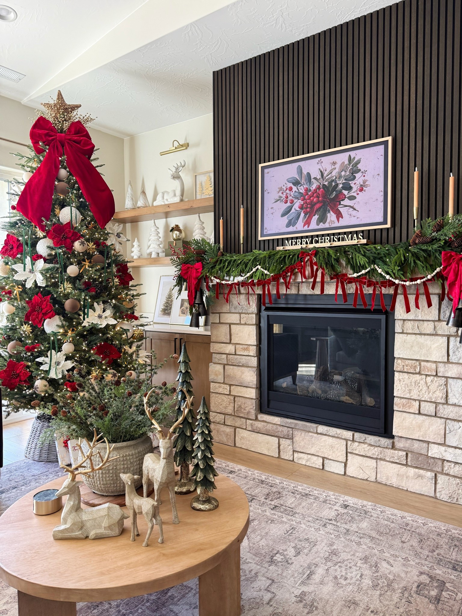 Bring the magic home 
Everything you see here is linked from the Christmas tree ribbons and ornaments to the mantel garland, winter greenery, and my Frame TV holiday art. These pieces sell out fast every December, so I rounded up the exact décor and the closest lookalikes for you. 🎄❤️
Tap to shop all my Christmas décor favorites! 
Perfect for anyone searching for:
• Christmas mantel ideas
• Cozy living room décor
• Red + neutral holiday design
• Christmas tree styling inspo

#LTKSaleAlert #LTKSeasonal #LTKHoliday